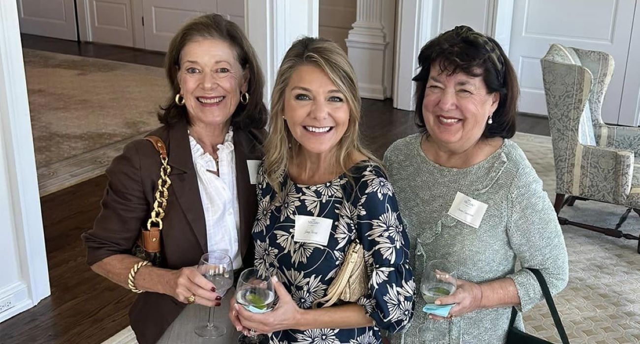 3 women smiling